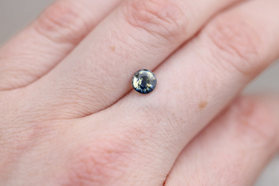 1.02ct round parti yellow blue sapphire