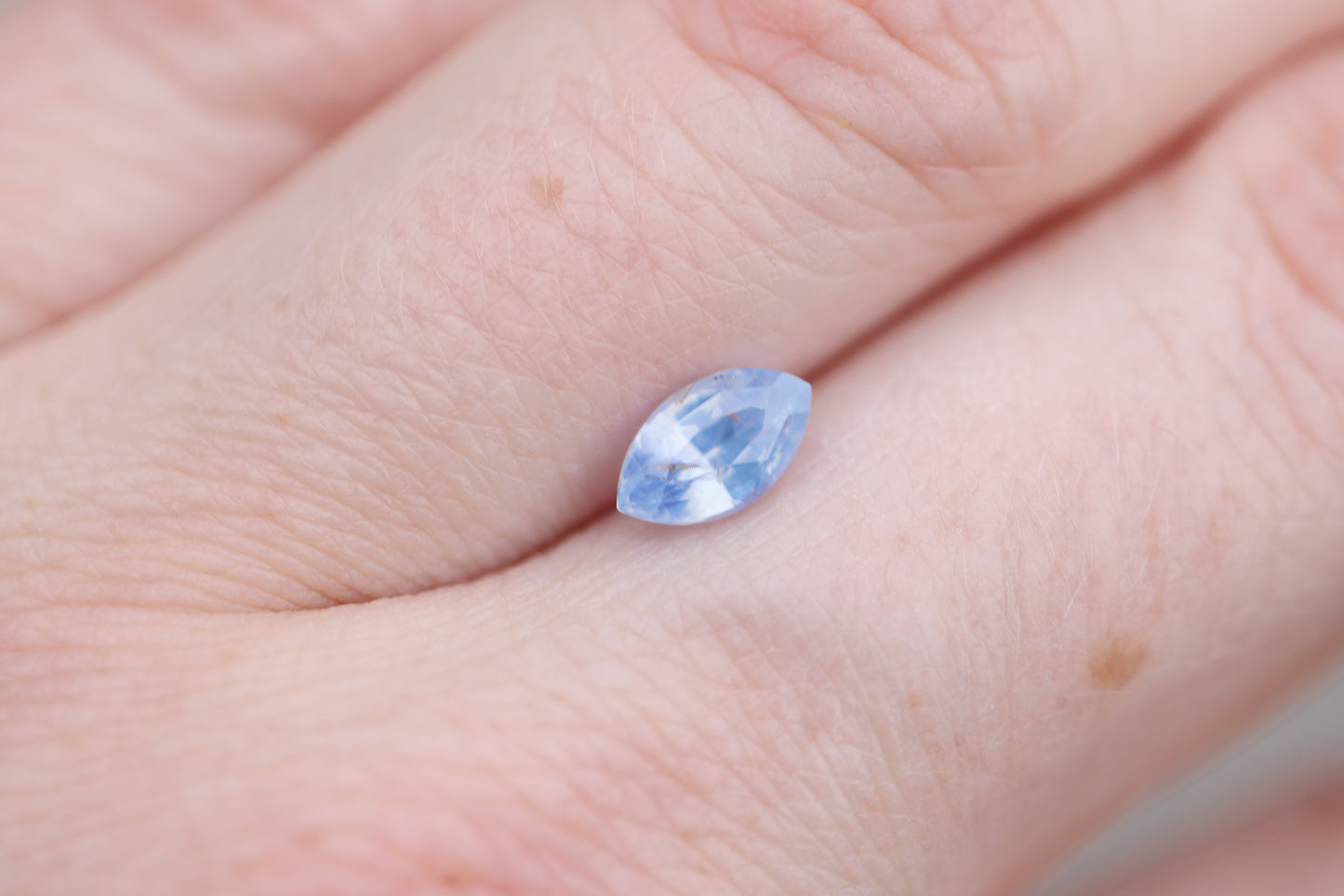 Load image into Gallery viewer, 1.24ct marquise opalescent light blue sapphire
