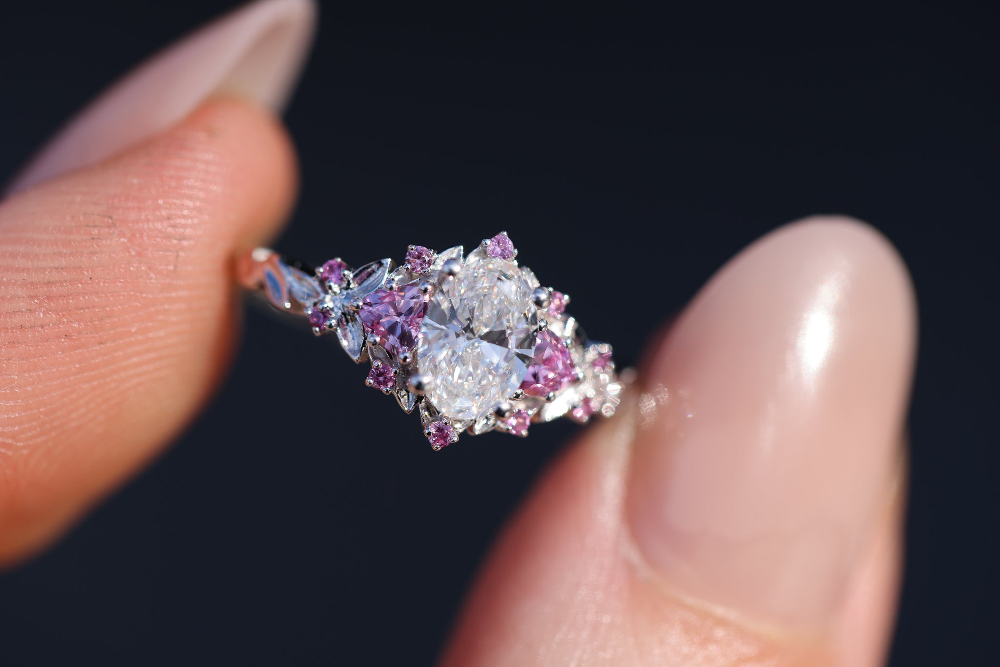 Briar Rose Three Stone with 7x5mm oval lab diamond center and pink