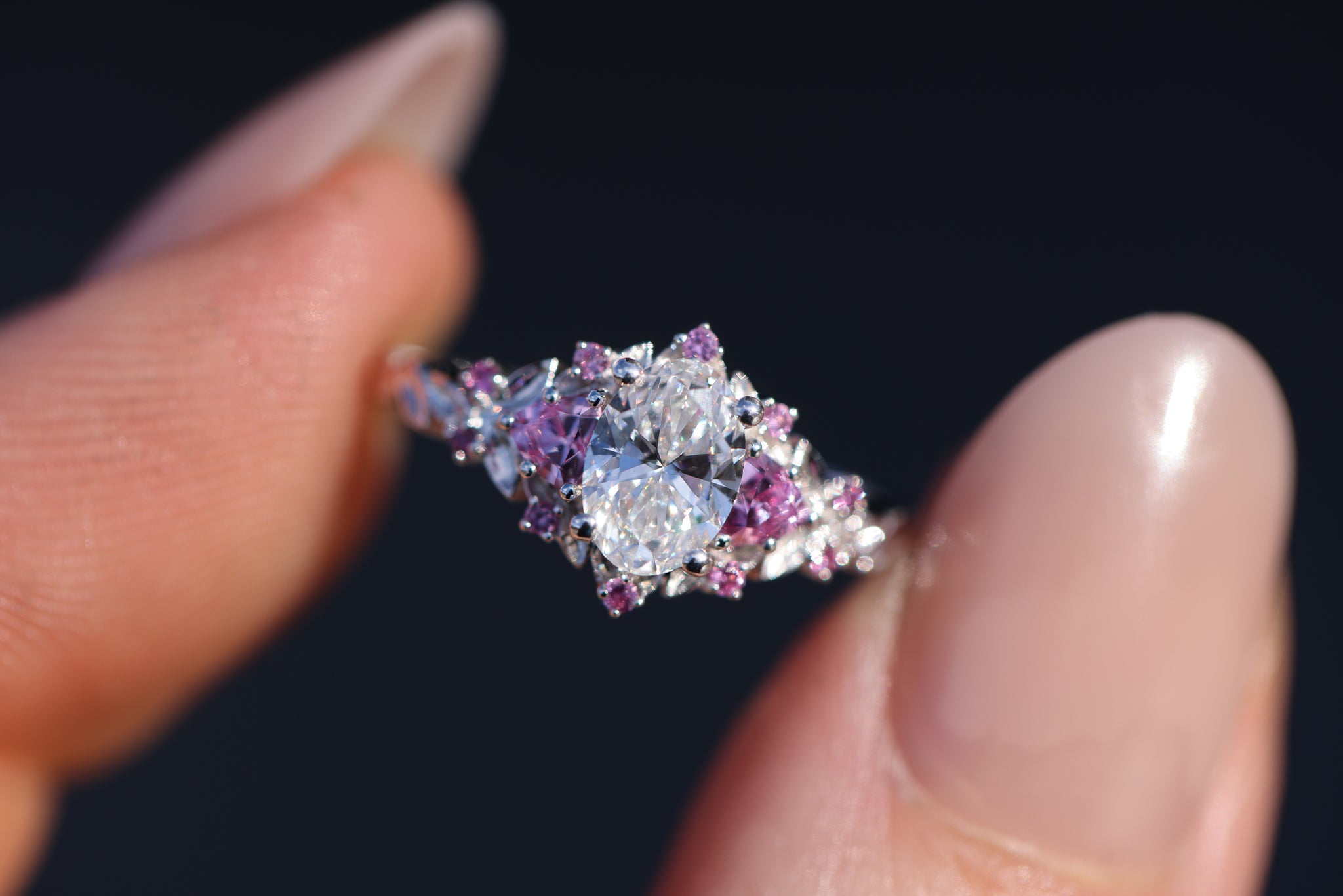 Briar Rose Three Stone with 7x5mm oval lab diamond center and pink