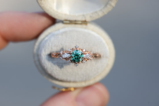 Briar rose three stone with round green moissanite