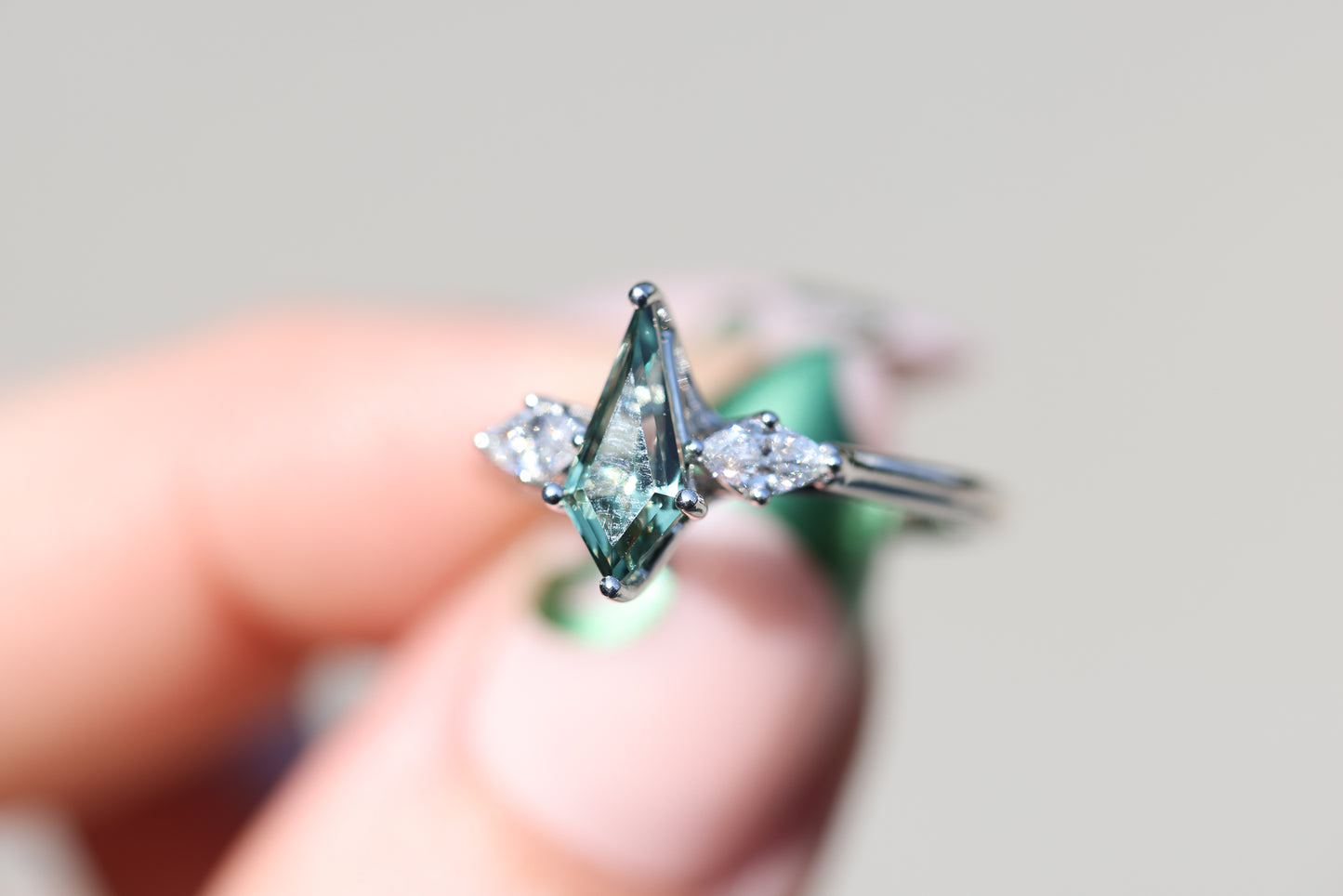 Load image into Gallery viewer, Shield green lab sapphire three stone with marquise side stones
