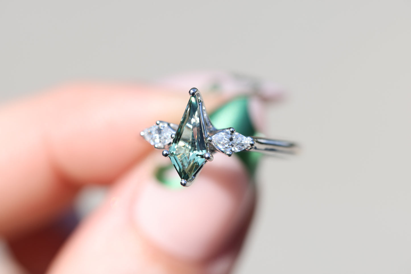 Load image into Gallery viewer, Shield green lab sapphire three stone with marquise side stones

