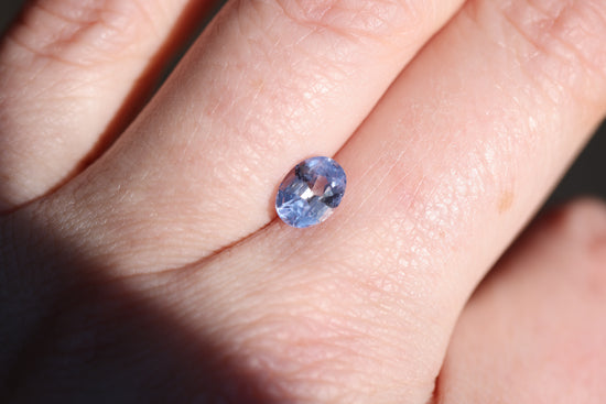 1.55ct oval opalescent light blue periwinkle sapphire