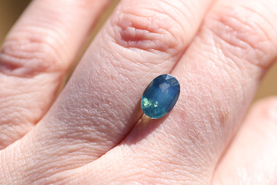 2.63ct oval opalescent blue teal sapphire