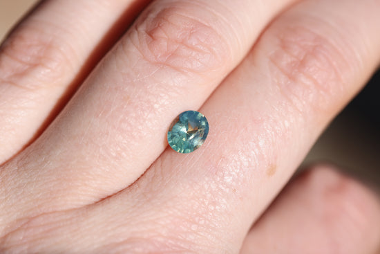 1.38ct oval teal sapphire