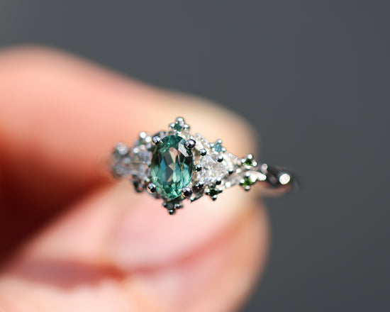 Load image into Gallery viewer, Briar rose three stone with oval lab green sapphire and green diamond accents
