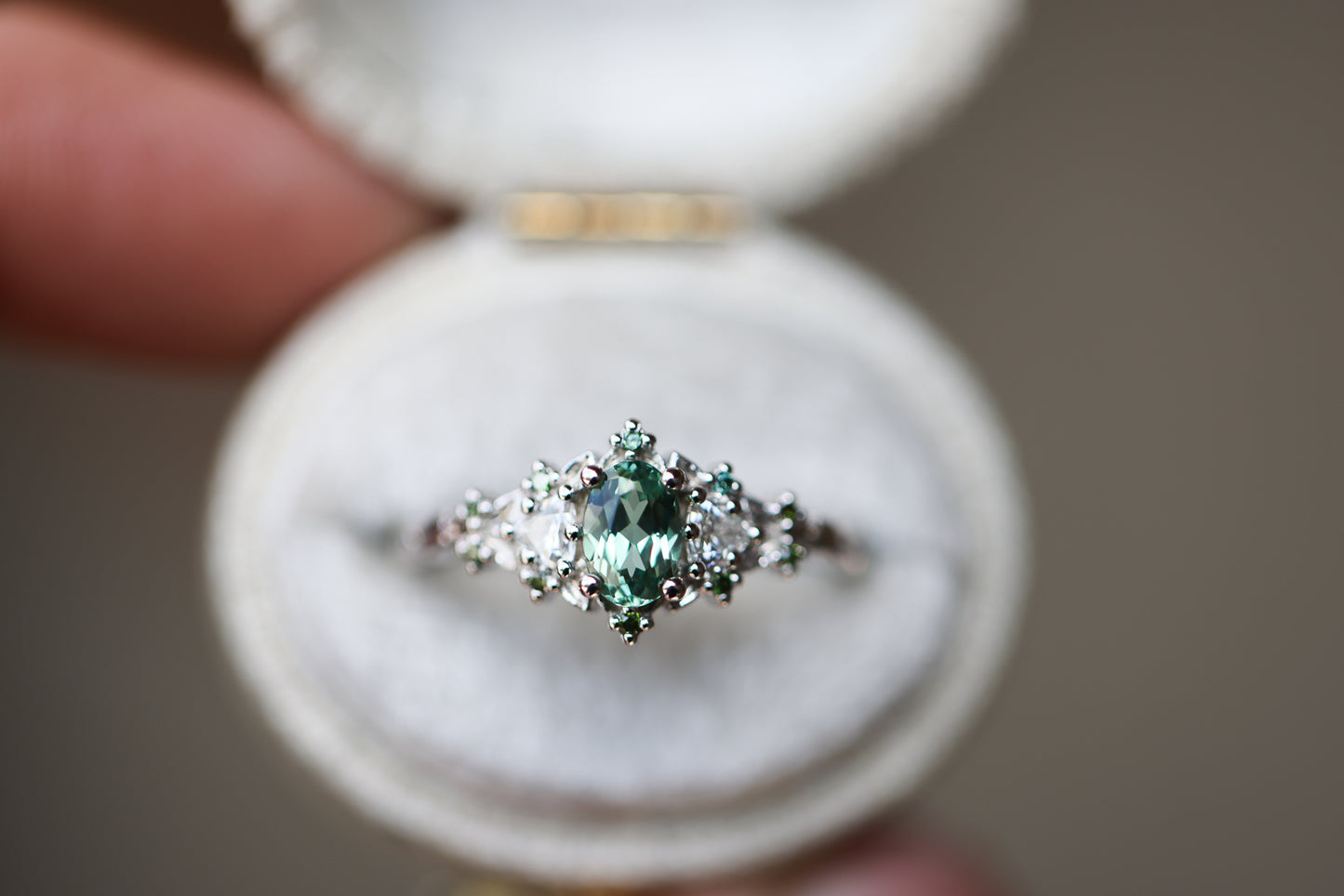 Load image into Gallery viewer, Briar rose three stone with oval lab green sapphire and green diamond accents
