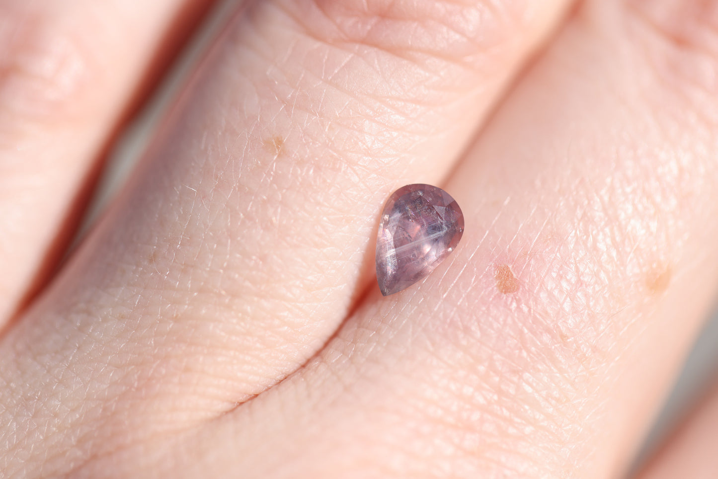 ON HOLD .96ct pear pink/mauve sapphire