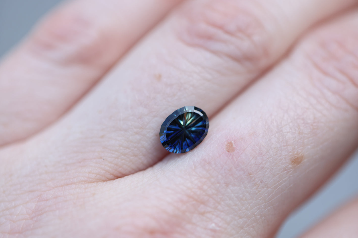 1.68ct oval blue yellow parti sapphire- Starbrite cut by John Dyer