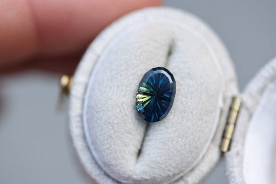 1.54ct oval blue yellow parti sapphire- Starbrite cut by John Dyer