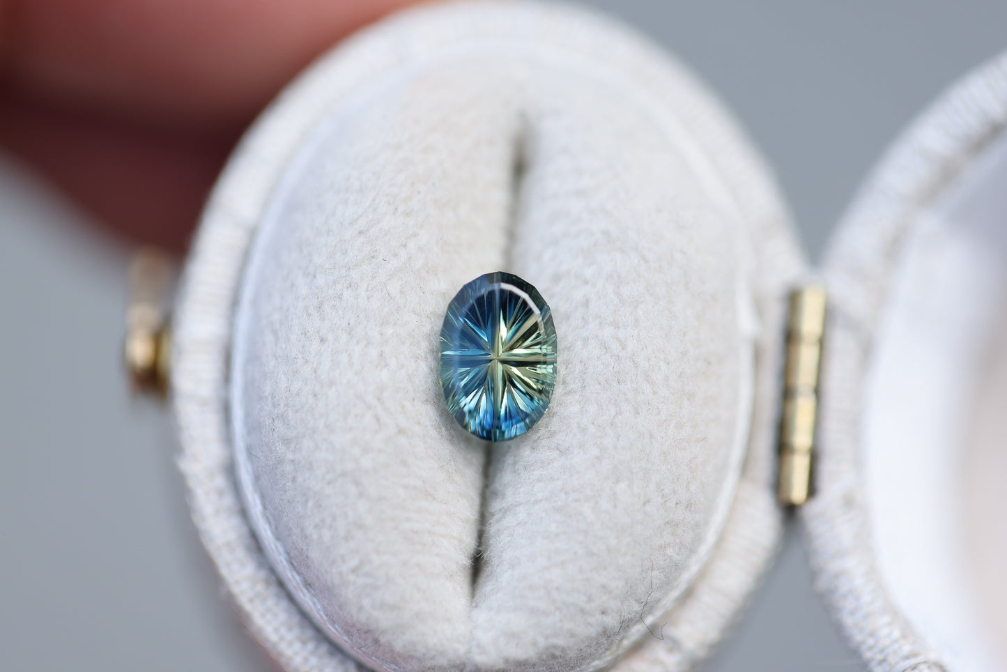 1ct oval blue green parti sapphire- Starbrite cut by John Dyer