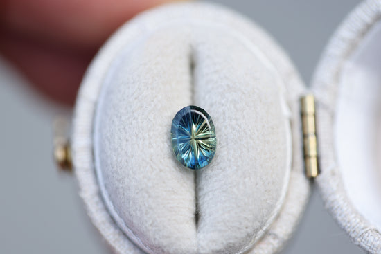 1ct oval blue green parti sapphire- Starbrite cut by John Dyer
