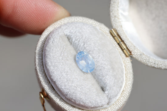 1.12ct oval opalescent light blue sapphire
