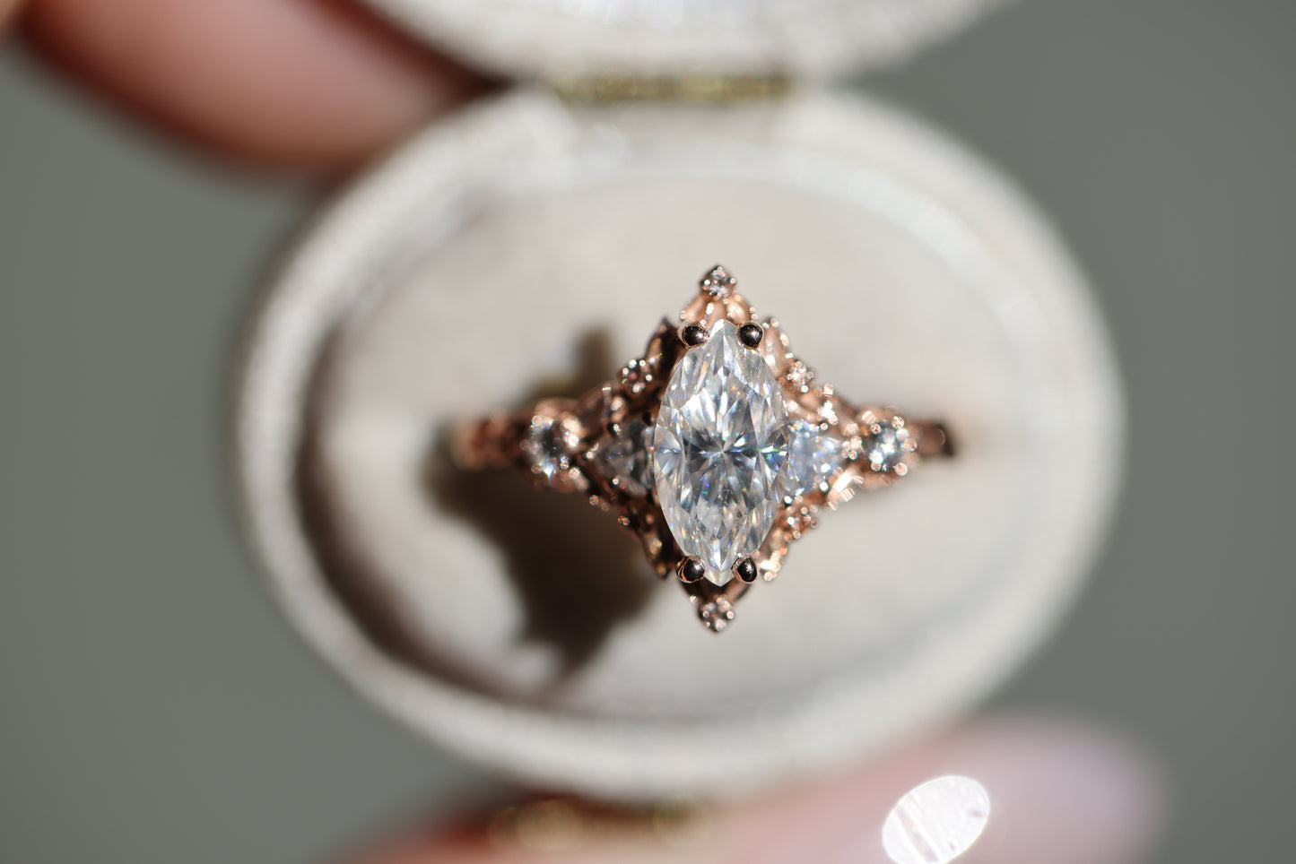 Load image into Gallery viewer, Briar rose five stone with 10x5mm marquise moissanite and peach sapphire
