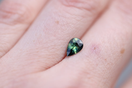 .94ct pear darker green blue sapphire