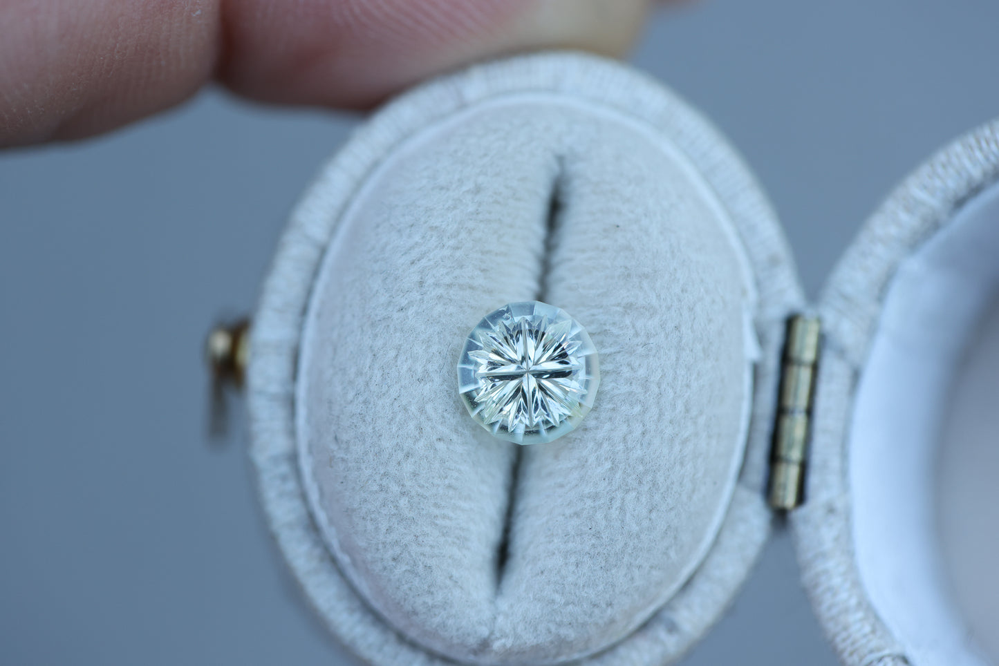 1.13ct round white sapphire, Starbrite cut by John Dyer