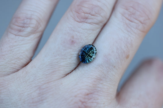 1.61ct oval parti sapphire, Starbrite cut by John Dyer