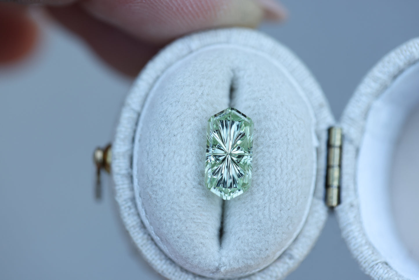 2.56ct elongated hexagon light green sapphire, Starbrite cut by John Dyer