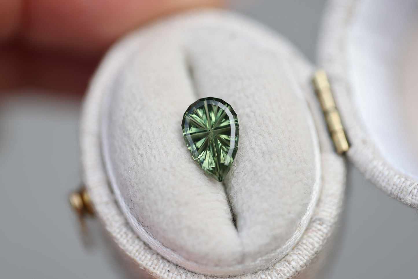 ON HOLD 1.24ct pear green sapphire - Starbrite cut by John Dyer