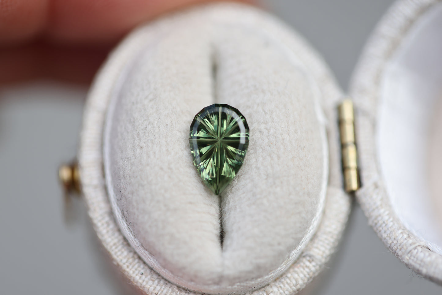 ON HOLD 1.24ct pear green sapphire - Starbrite cut by John Dyer