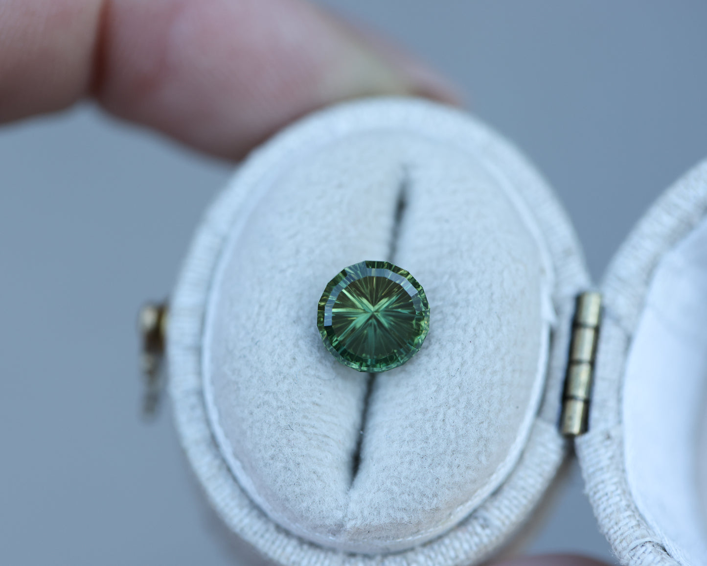 2.07ct round green teal sapphire, Starbrite cut by John Dyer