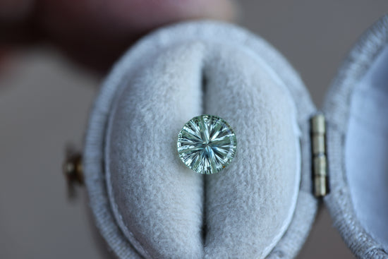 1.25ct round light teal mint sapphire - Starbrite cut by John Dyer