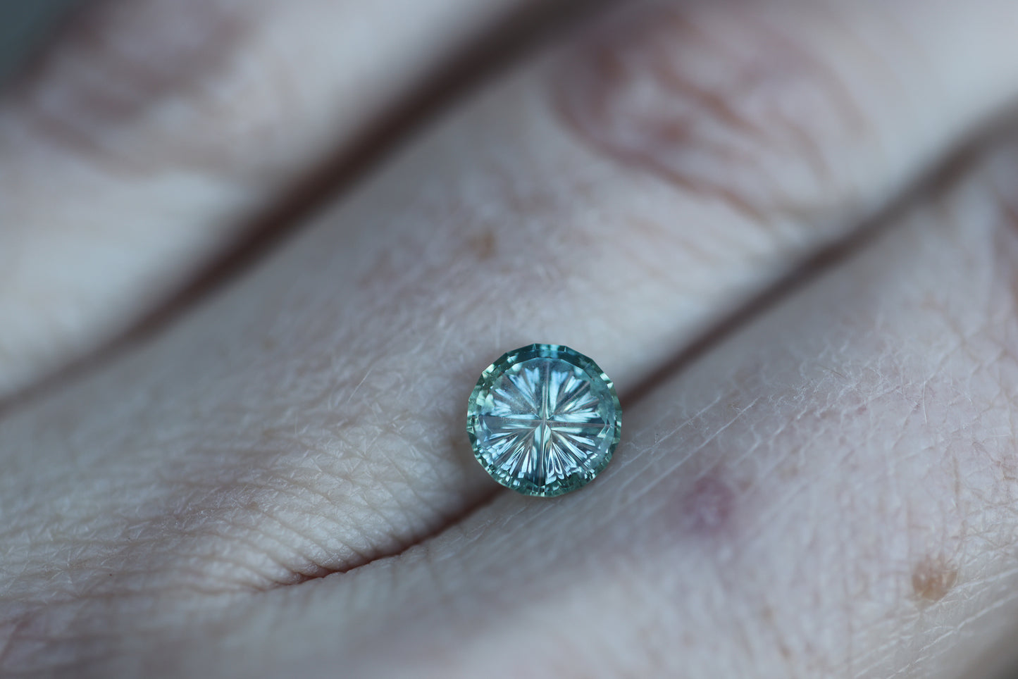1.05ct round blue teal sapphire - Starbrite cut by John Dyer