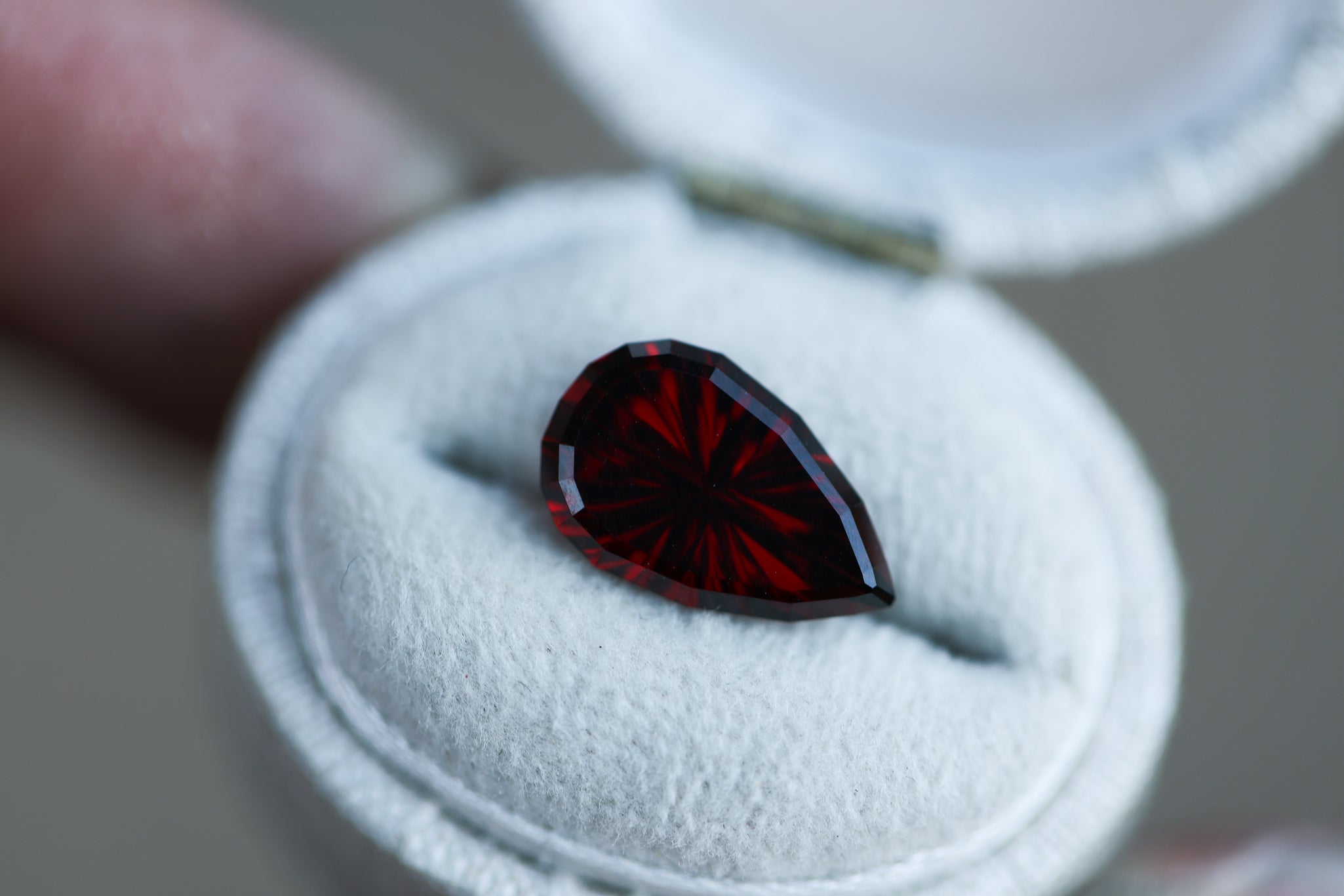 3.54ct pear scarlet garnet - Starbrite cut by John Dyer – Oore Jewelry