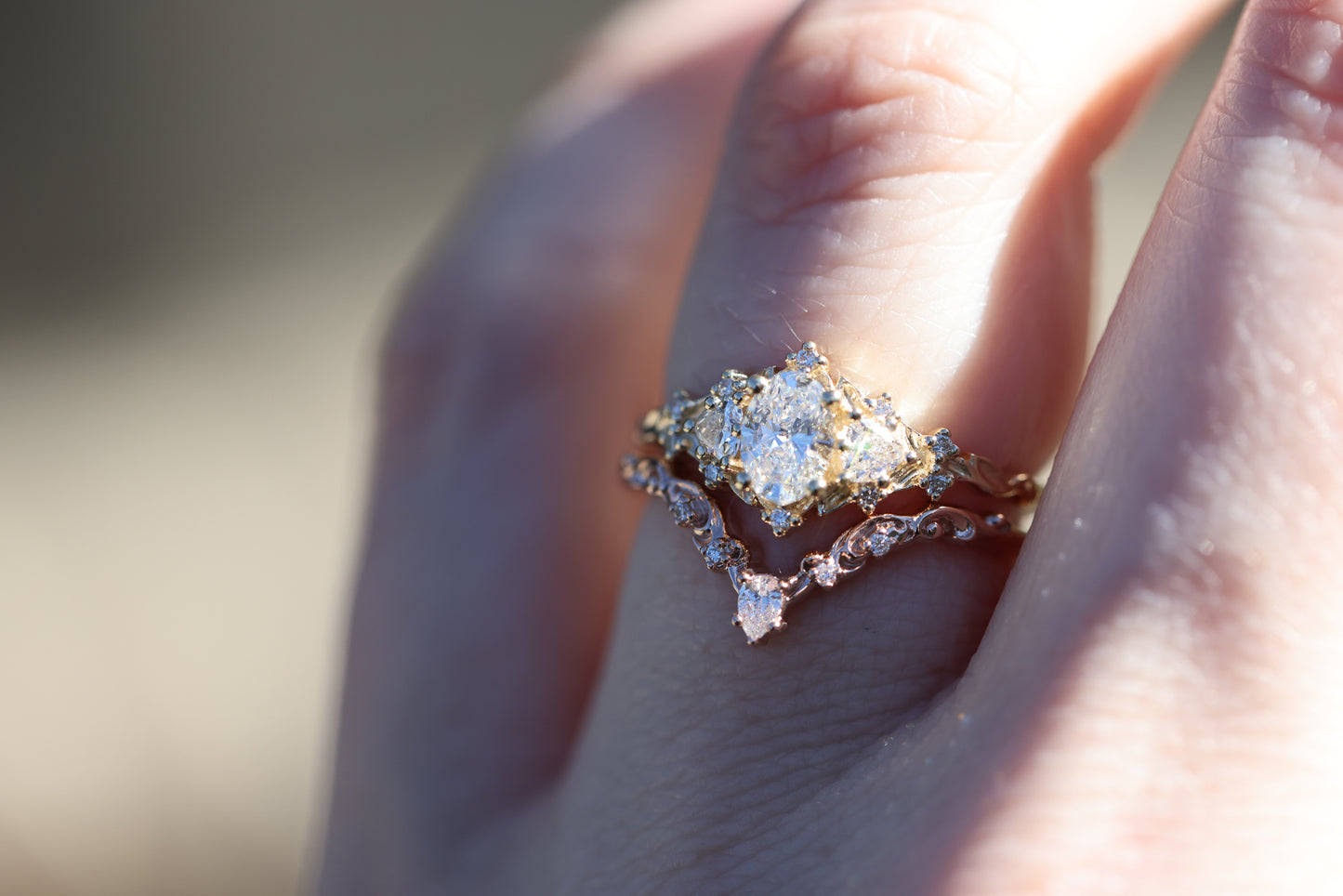 Curved filigree with pear center