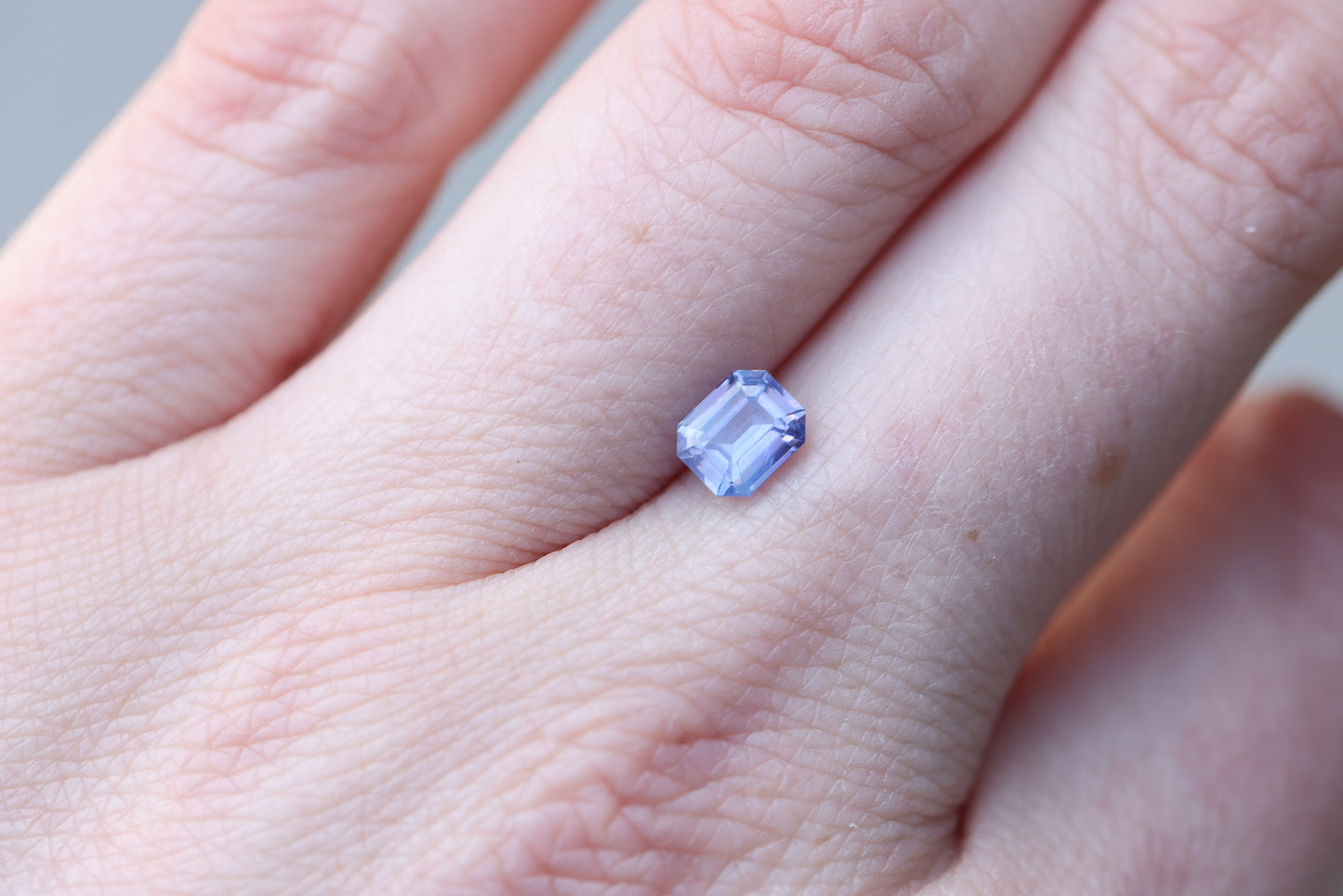 1.04ct emerald cut blue sapphire