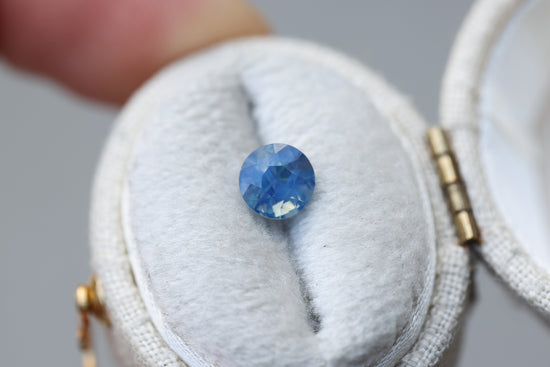 1.15ct round opalescent blue teal sapphire