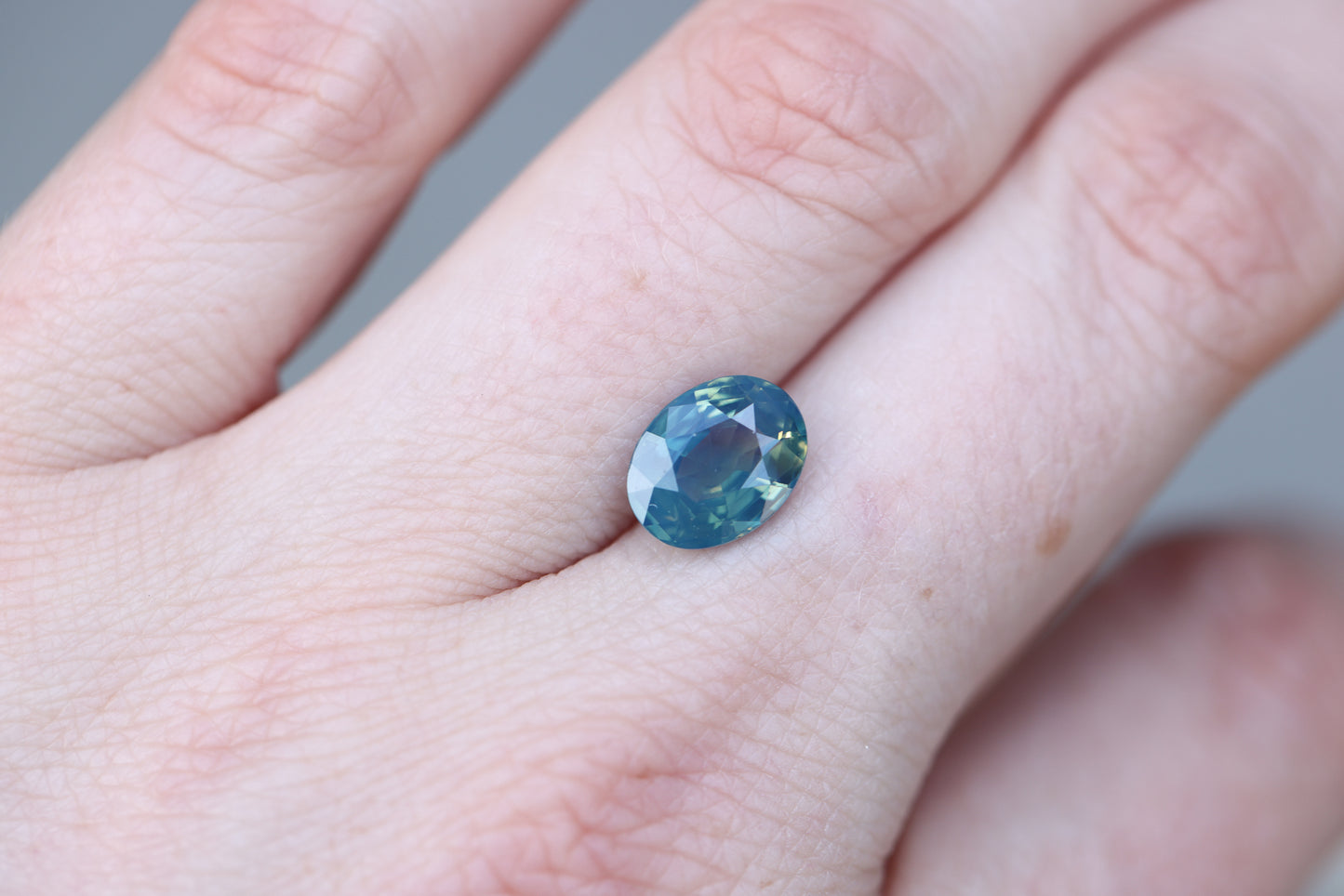 3.03ct oval opalescent blue teal sapphire