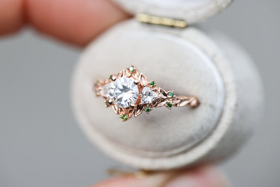 Load image into Gallery viewer, Briar rose three stone with 5.5mm round moissanite and green diamonds accents
