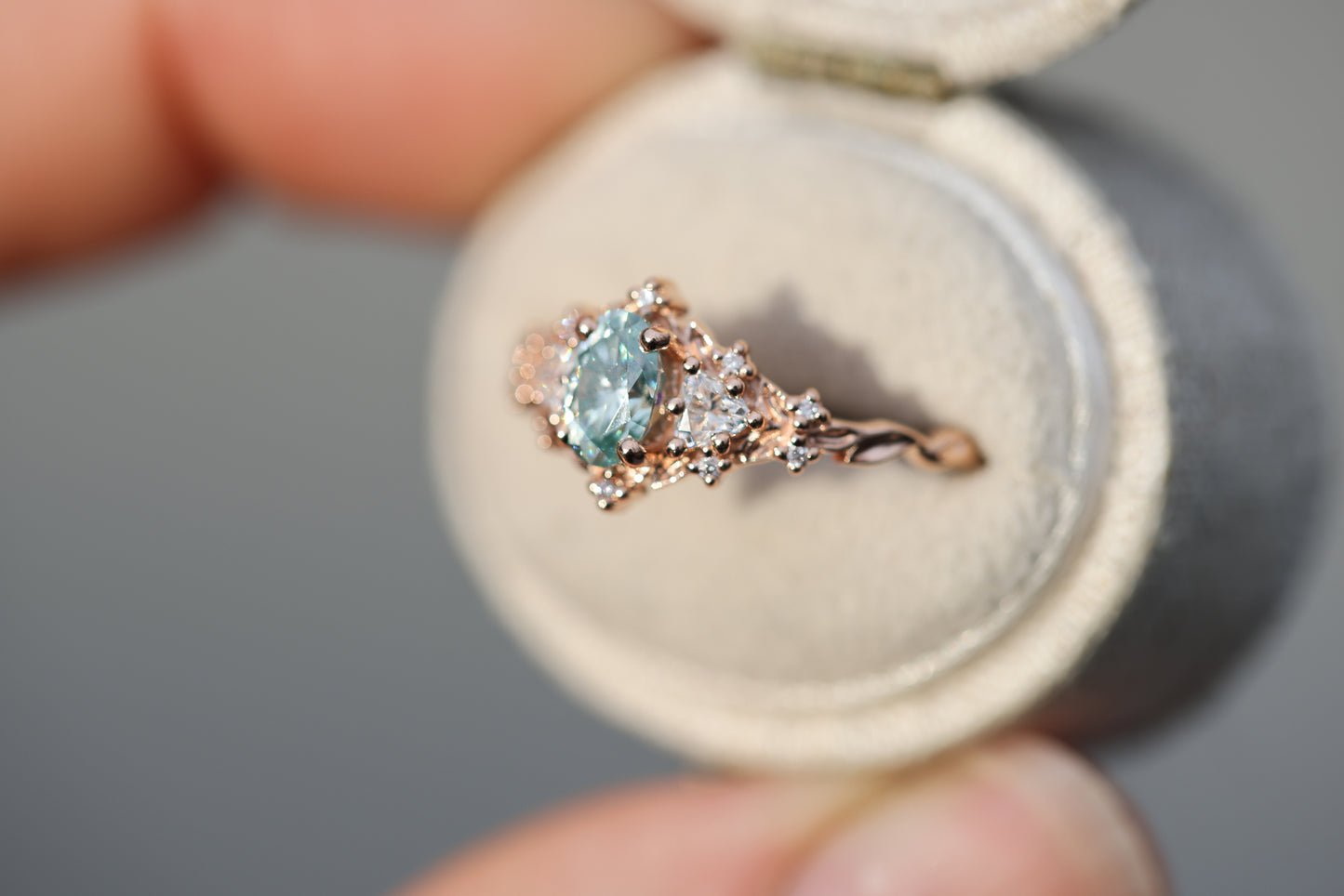 Briar rose three stone with 6x4mm oval teal moissanite