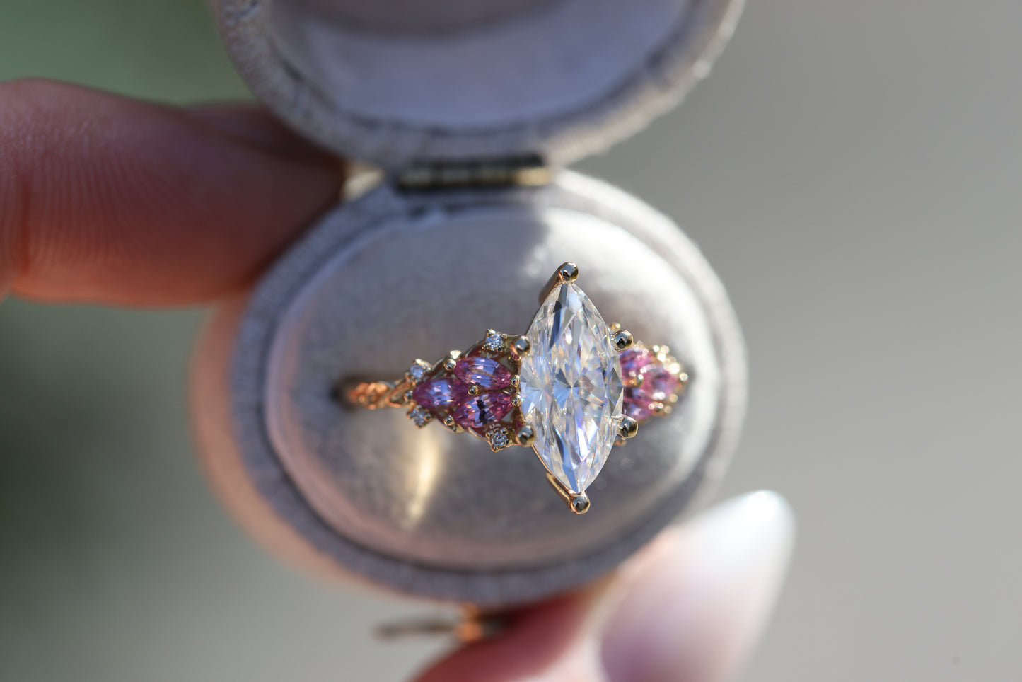 Enchanted garden with 2ct moissanite center and pink sapphire sides