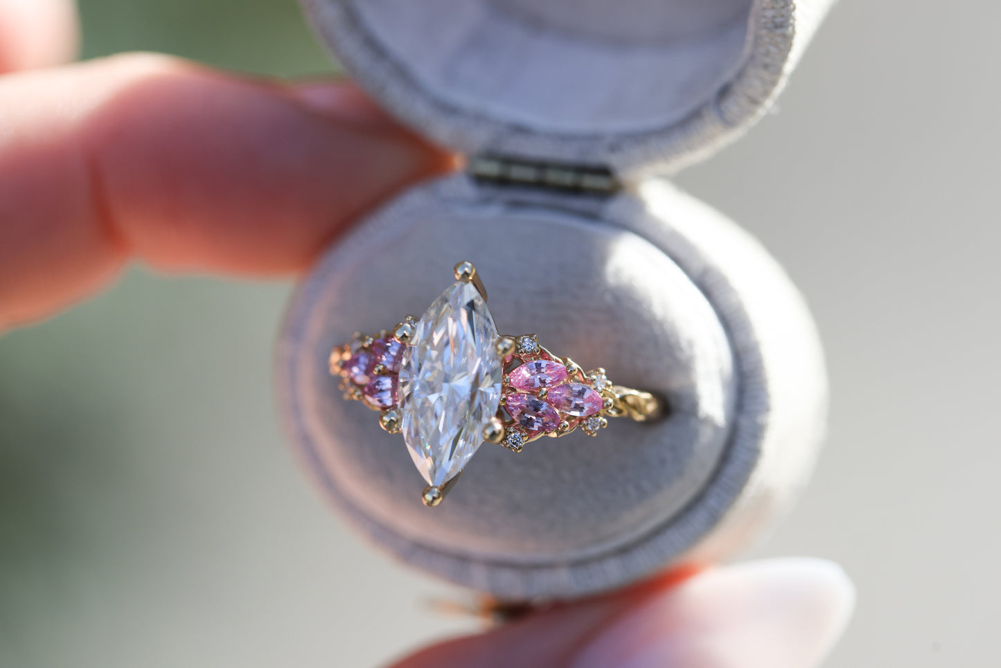 Enchanted garden with 2ct moissanite center and pink sapphire sides