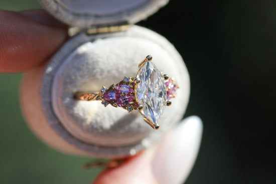 Enchanted garden with 2ct moissanite center and pink sapphire sides