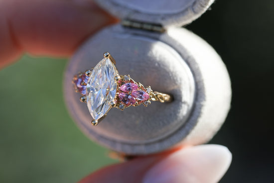 Enchanted garden with 2ct moissanite center and pink sapphire sides