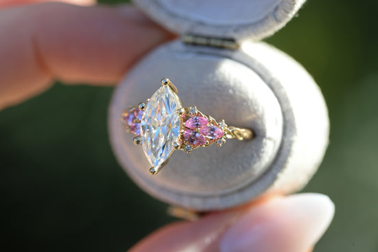 Enchanted garden with 2ct moissanite center and pink sapphire sides