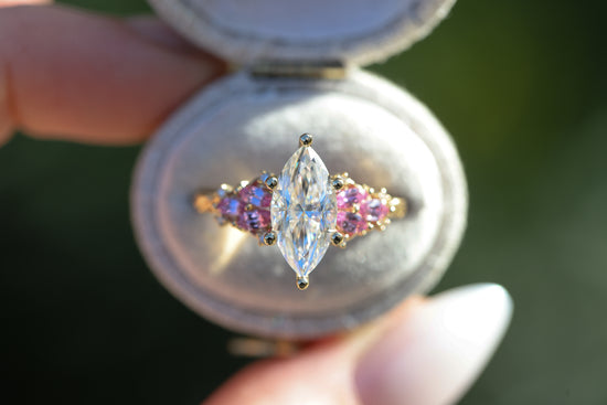 Enchanted garden with 2ct moissanite center and pink sapphire sides