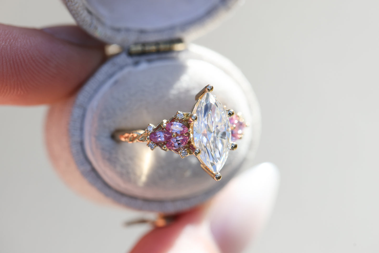 Enchanted garden with 2ct moissanite center and pink sapphire sides