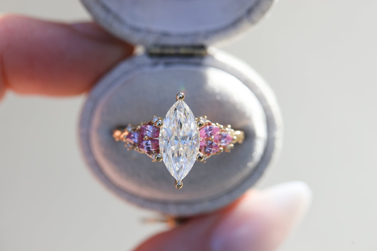 Enchanted garden with 2ct moissanite center and pink sapphire sides