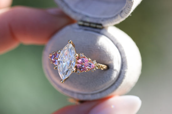 Enchanted garden with 2ct moissanite center and pink sapphire sides