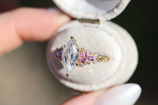 Enchanted garden with 2ct moissanite center and pink sapphire sides