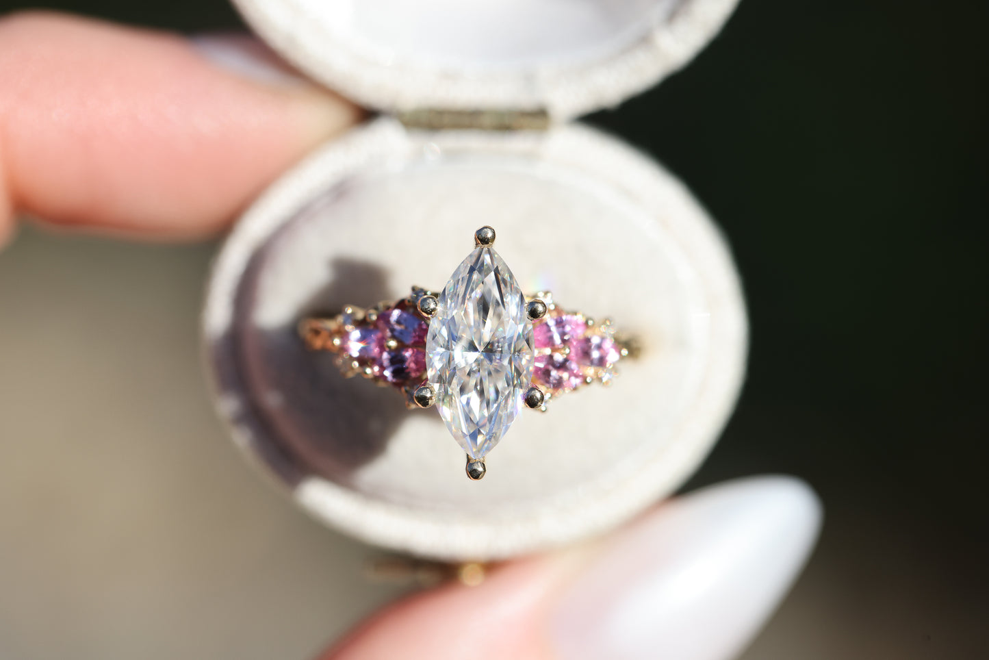 Enchanted garden with 2ct moissanite center and pink sapphire sides