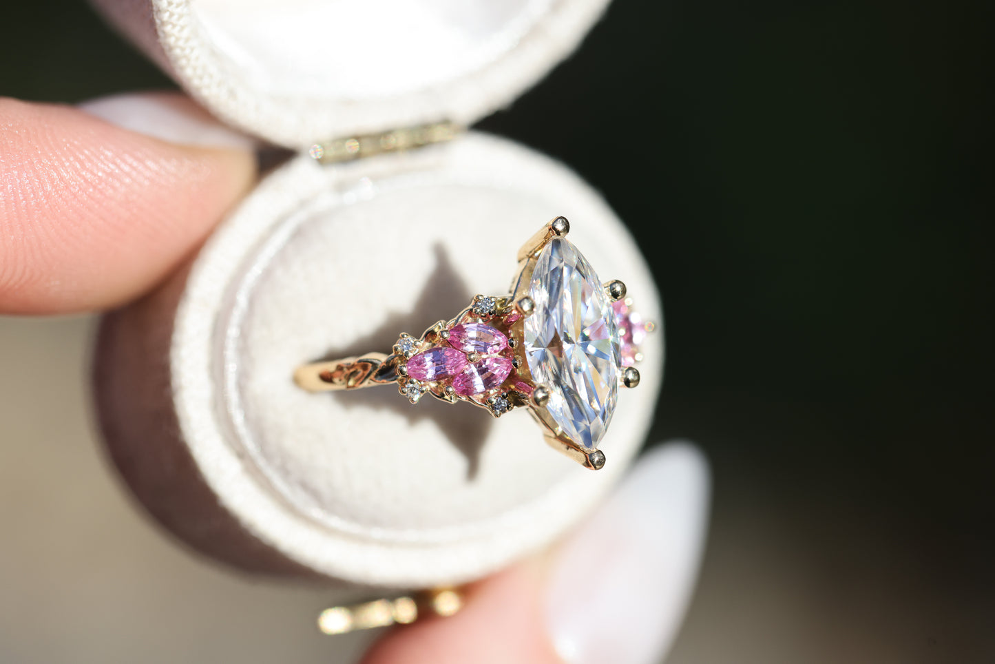 Enchanted garden with 2ct moissanite center and pink sapphire sides