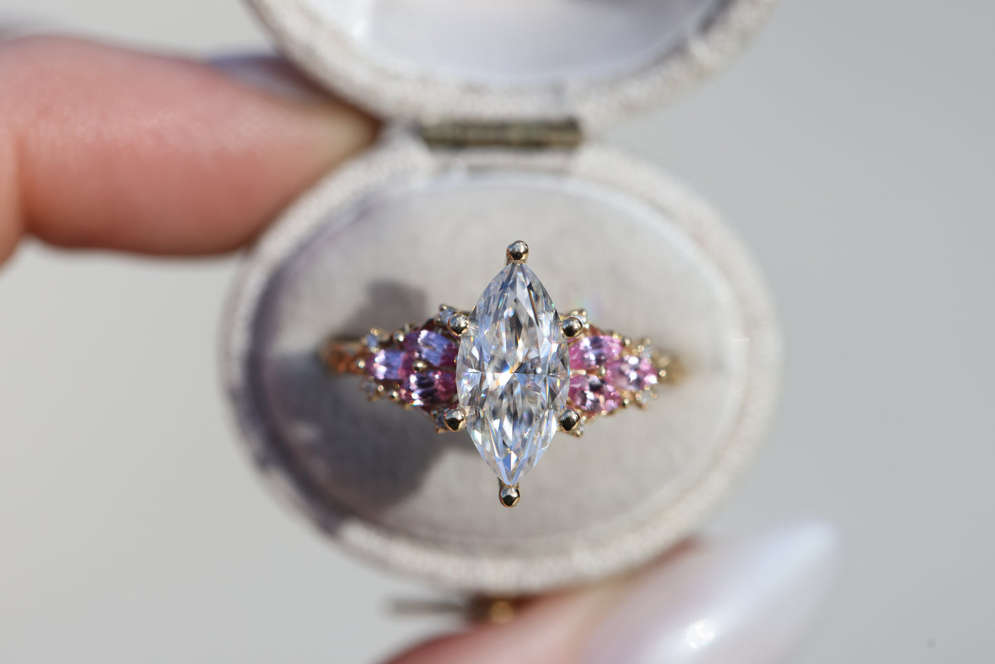 Enchanted garden with 2ct moissanite center and pink sapphire sides