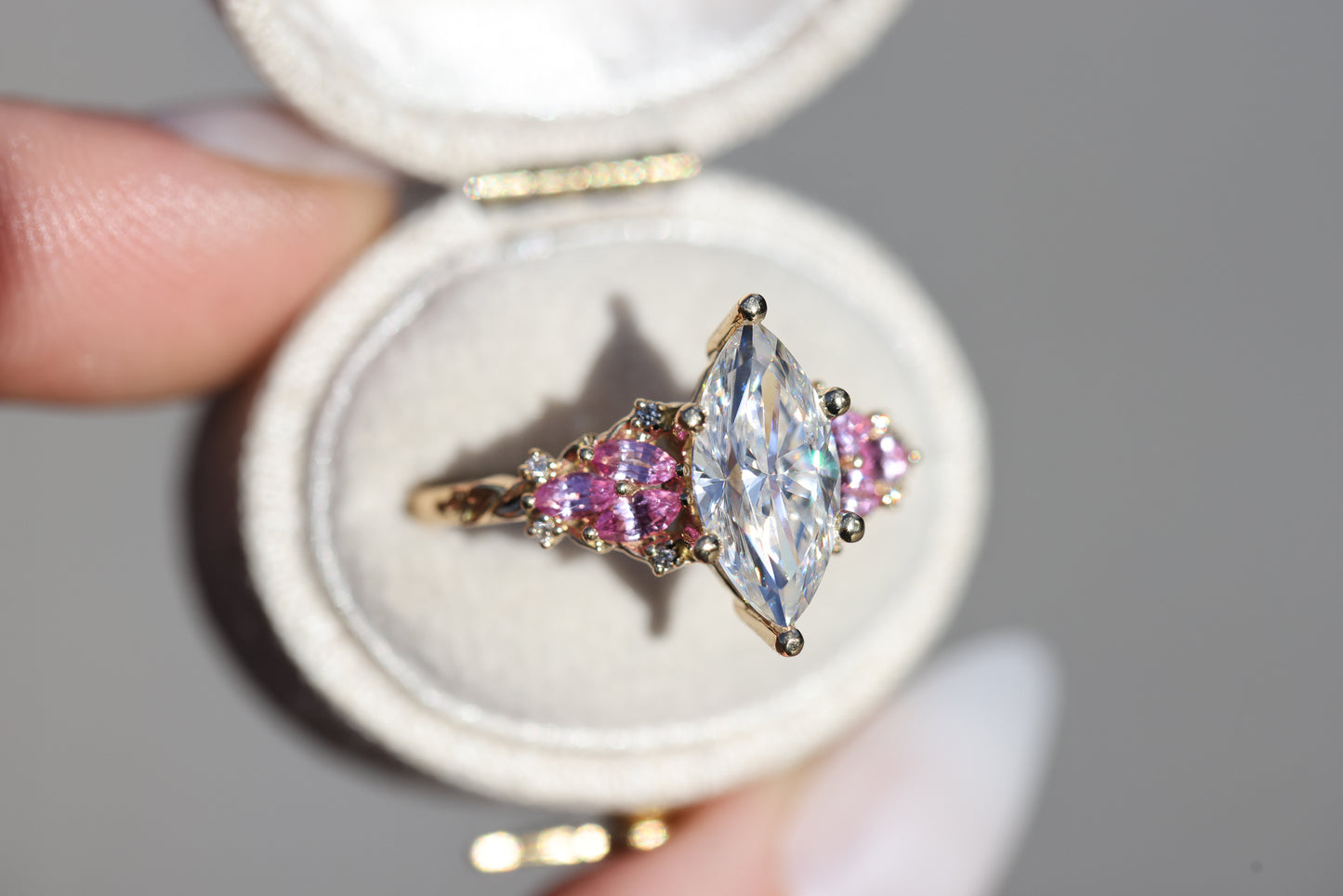 Enchanted garden with 2ct moissanite center and pink sapphire sides