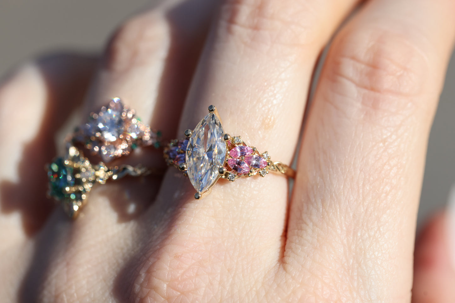 Enchanted garden with 2ct moissanite center and pink sapphire sides